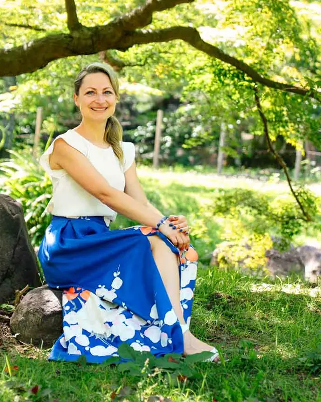 Alyse sitting in a Japanese garden